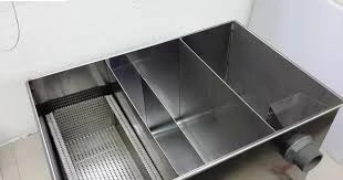Commercial grease trap system - essential component for restaurants and food service businesses to prevent grease and oil from entering the wastewater system